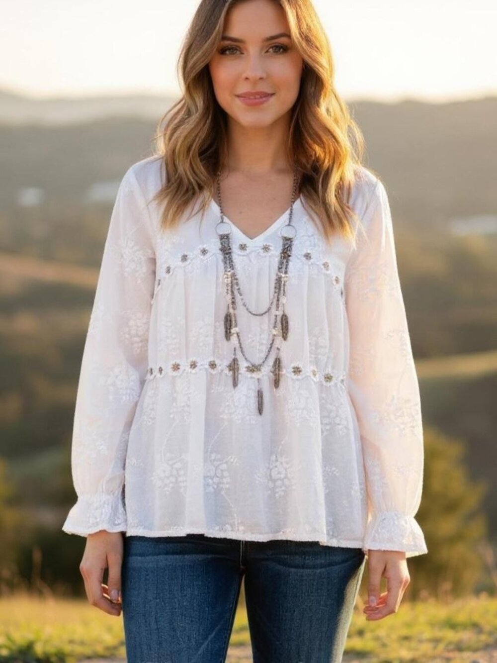 White embroidered long sleeve top